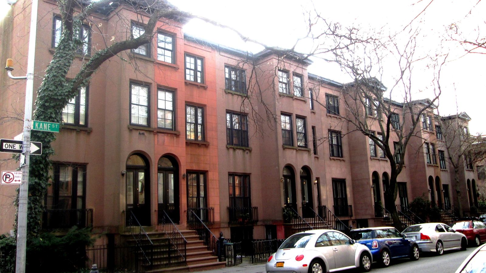 Brownstone row houses along Kane Street in Brooklyn